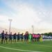 Vaughan Azzurri and Blue Devils teams stand before kick off