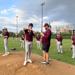 Michael Jensen giving physical cues to Augsburg Pitcher Jake Gonse
