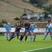 Players on the field during a match between Flatirons FC and CISA.