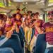 Minneapolis Roosevelt Baseball players celebrate Oliver Roark's no hitter on the team bus
