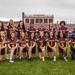Minnneapolis Roosevelt Girls Varsity Flag Football team pose on the field at Al Gowans Stadium