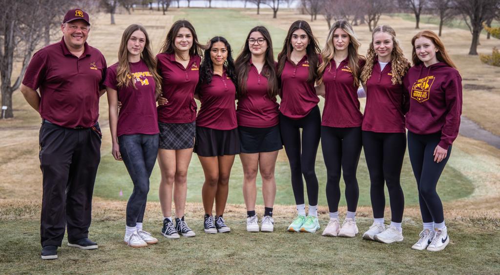 Minneapolis Roosevelt High School girls golf team posing for a team photo at Hiawatha Golf Course.