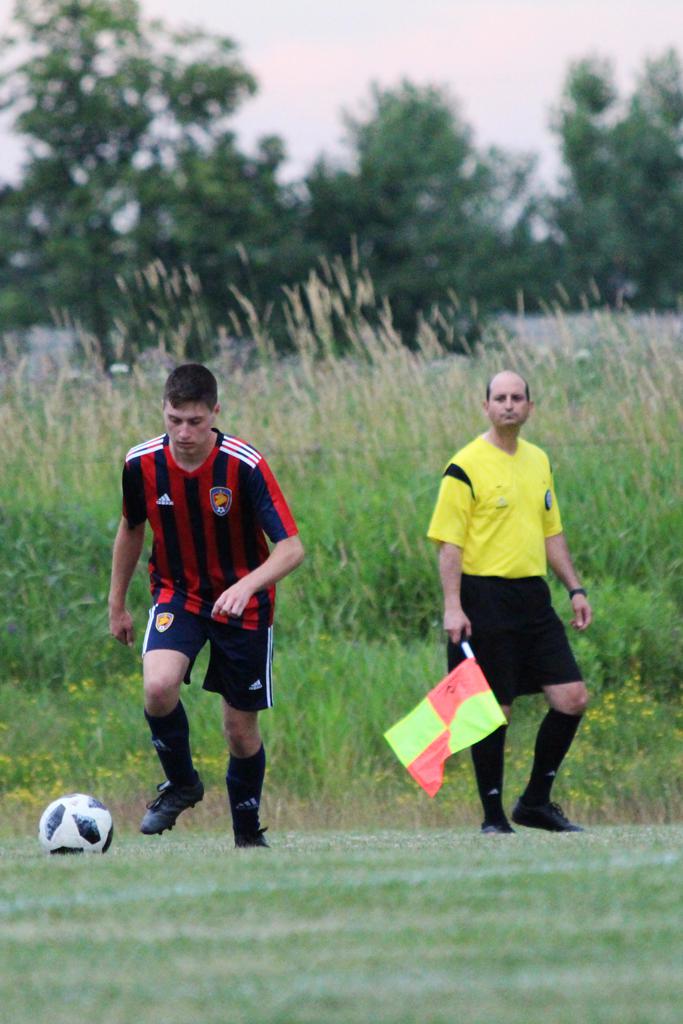 linesman officiating at a competitive game