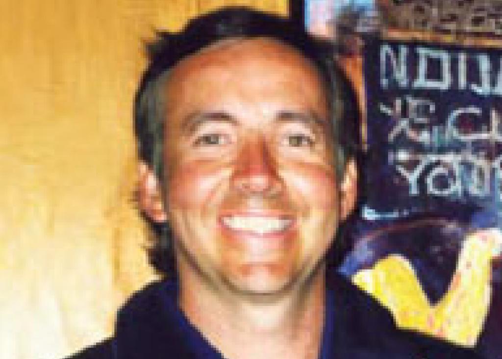 Minneapolis Roosevelt alumn Greg Wicklund smiling at the camera