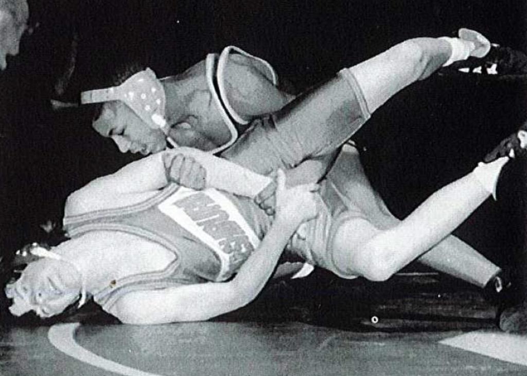 Minneapolis Roosevelt wrestlerMarcus LeVesseur as a Roosevelt Teddy pinning his Washburn oppenant