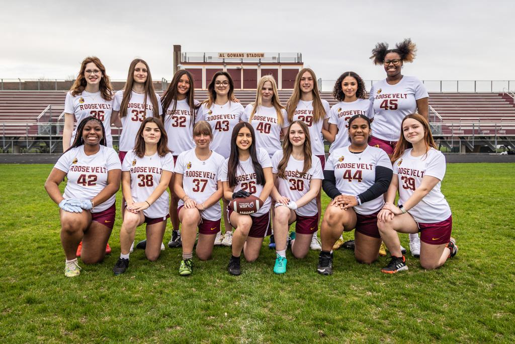 Minnneapolis Roosevelt Girls JV Flag Football team pose on the field at Al Gowans Stadium
