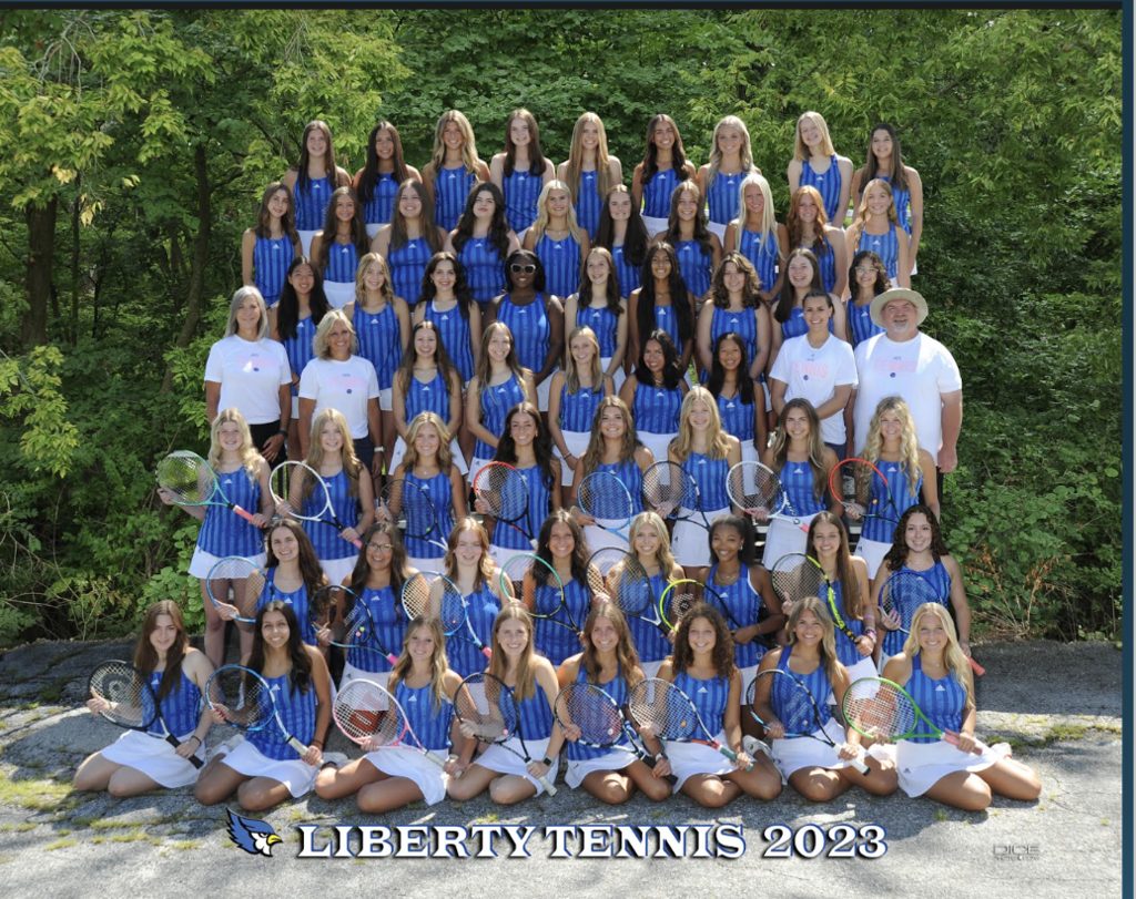 Women's tennis team posing in a team photo