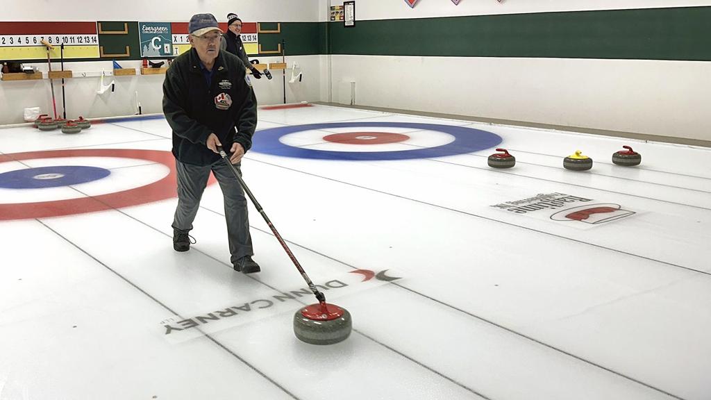 Stick curling delivery during a Sturling game