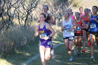 Abby Chestovich running at the Minnesota State Cross Country Meet